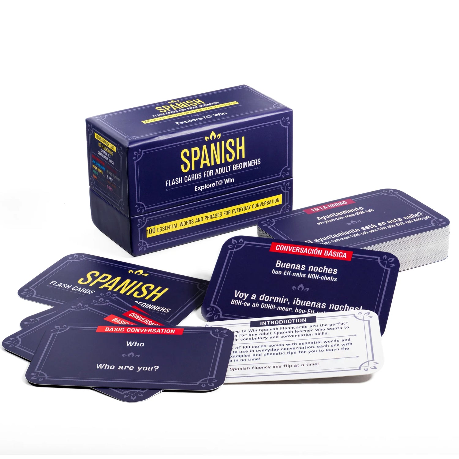 Spanish flashcards laid out in front of the box 